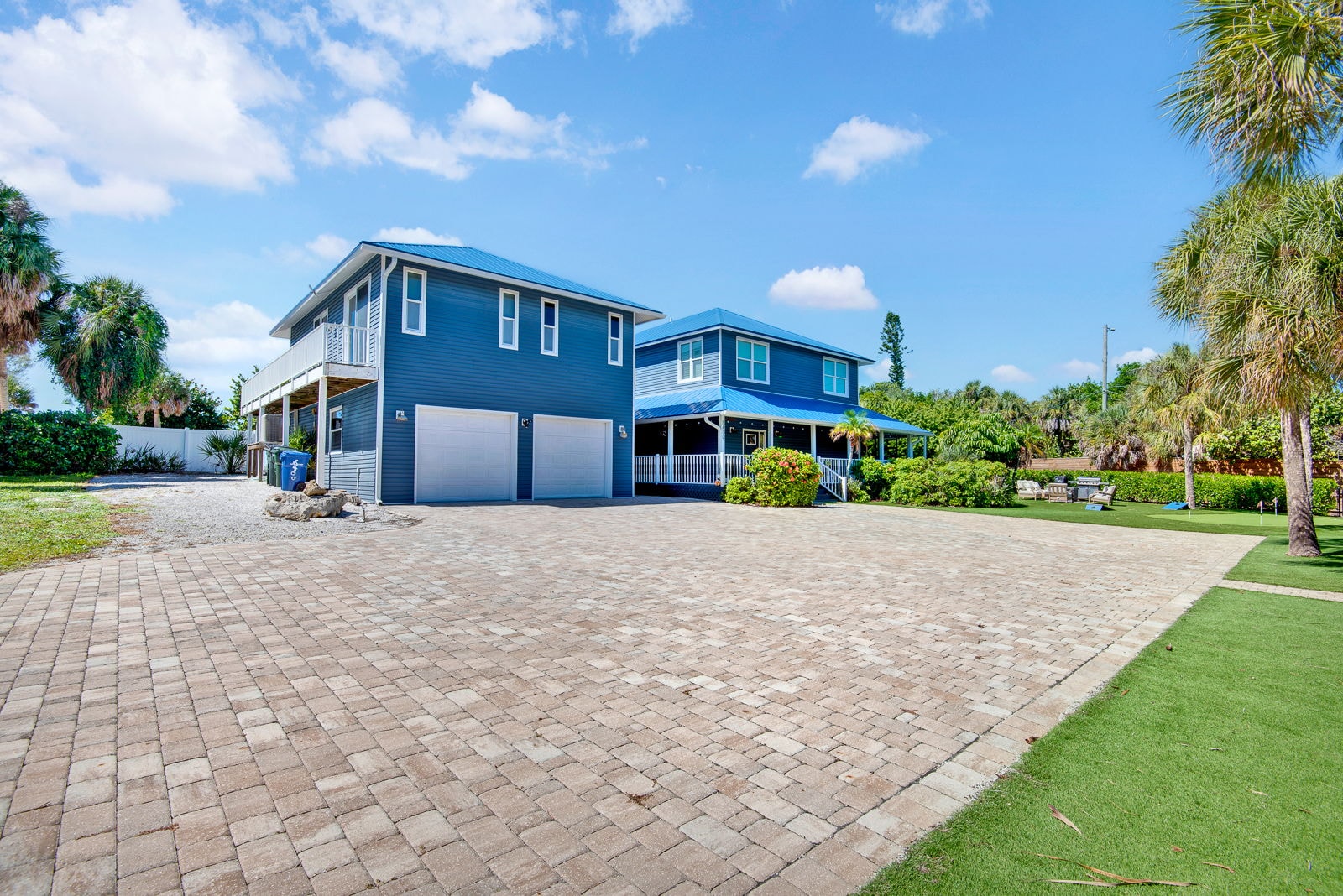 Front exterior of Blue Iguana Estate from the paver driveway