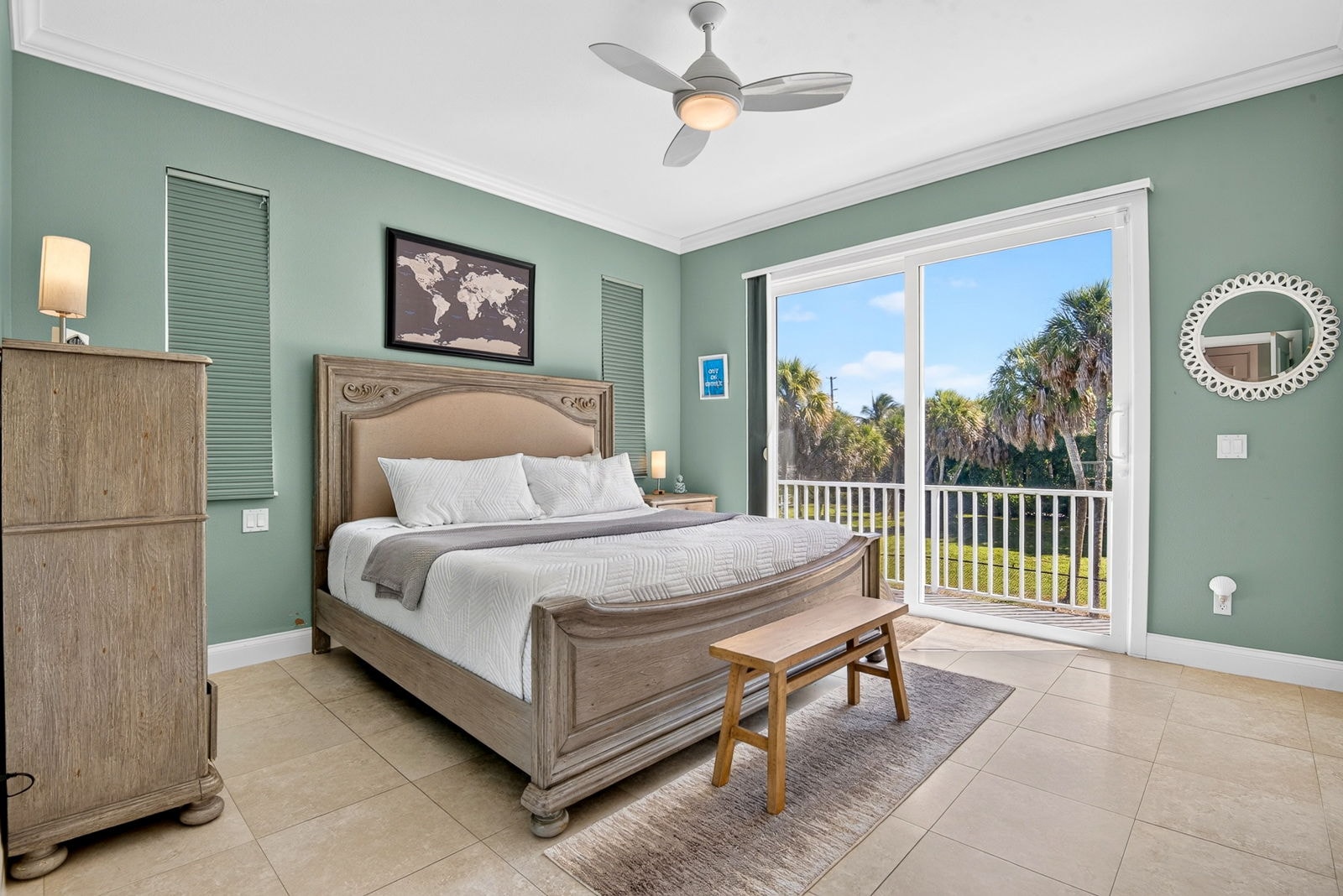 Primary bedroom with balcony doors open to the Gulf breeze